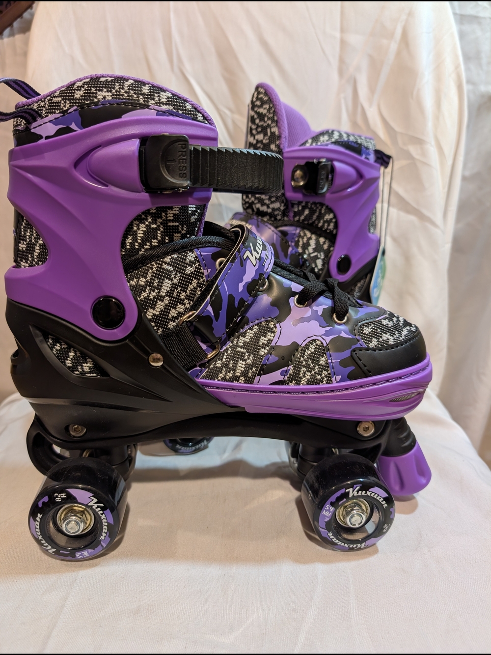 Kuxuan Adjustable Purple Girls Quad Roller Skates with Secure Straps